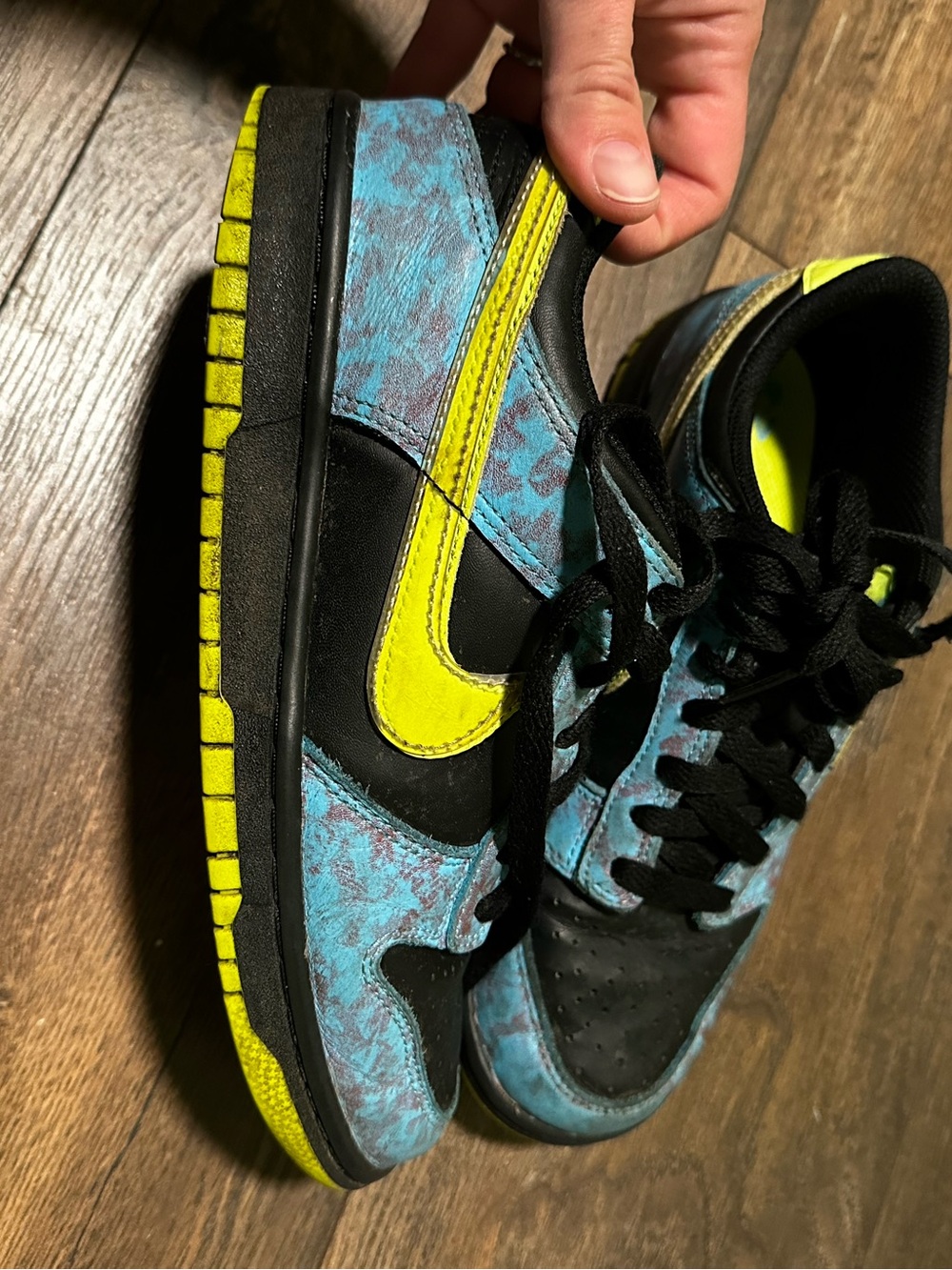 Nike Black Shoe Interior with Neon Green Insole and Blue Logo